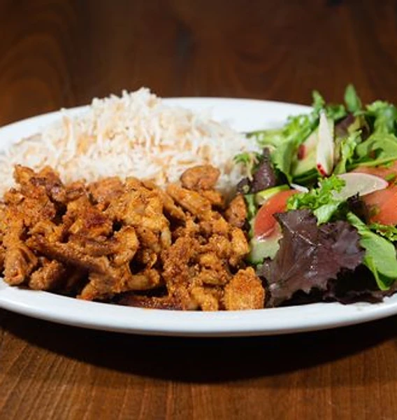 Shawarma chicken with basmati rice and salad at Chez Mansour