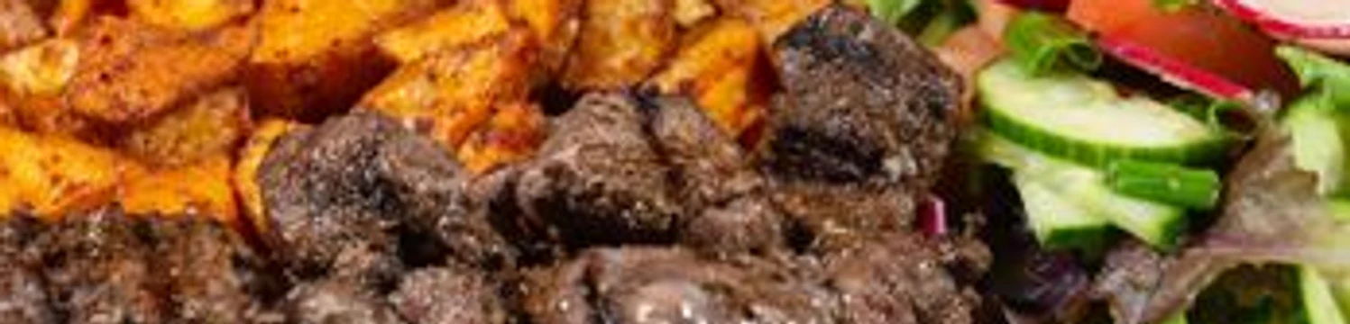 Beef kabab with roasted potatoes and salad